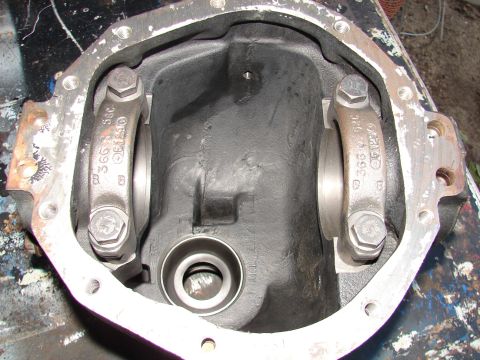 1996 Ford Bronco - Close-up of a differential housing showing bearing caps and internal components.