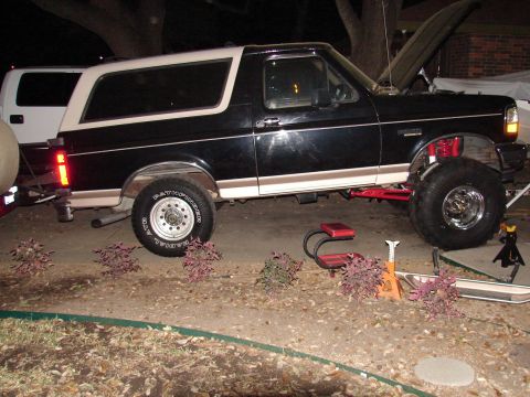 1996 Ford Bronco - This 1996 Ford Bronco features a lifted suspension and oversized tires, suggesting modifications for off-road use.