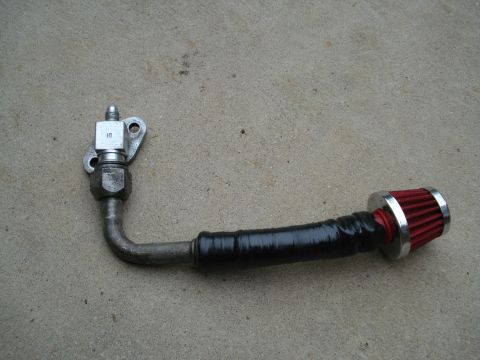 1996 Ford Bronco - This is the intake tube. It was on the york stock, but i used a hose repait kit to attach the filter. Its all covered in Electrical tape to…
