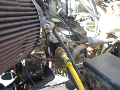 1996 Ford Bronco - Here is the filter and check valve. Again, I used the stock hose and put in a fitting to attatch the filter.
