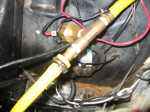 1996 Ford Bronco - Here is the pressure switch. it mounted inline with the section of hose that runs out the front. Its hidden under the storage tray i have i…