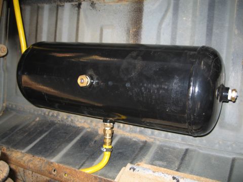 1996 Ford Bronco - Here is the tank. The hose on the goes out the back and the hose in the middle is coming from the engine compartment.