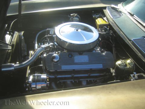 1985 Ford Mustang - Engine bay details including a chrome air cleaner and V8 engine components.