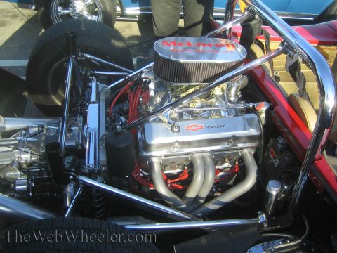 1985 Ford Mustang - Close-up of a Chevrolet engine a McLaren air cleaner, seen at a car show.