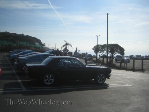 1985 Ford Mustang - Classic Mustang at a car show event by the coast.