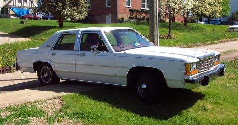 1985 Ford Crown Victoria LTD - This 1985 Ford Crown Victoria LTD sedan is seen from a 3/4 front angle.