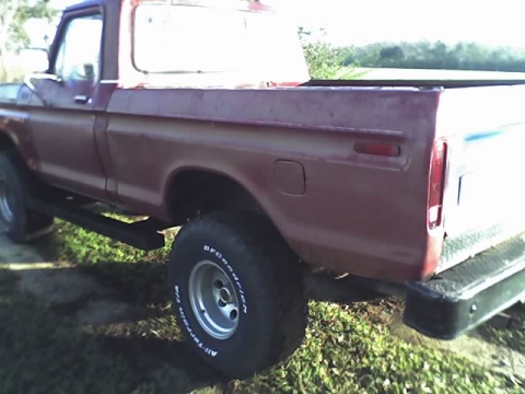 1979 Ford F-150 - This pickup truck has a side view with BFGoodrich All-Terrain T/A tires and a step bar.