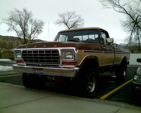 1979 Ford F-150 - This pickup truck features a prominent grille and two-tone paint scheme.