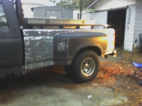 1990 Ford F-350 - This 1990 Ford F-350 pickup truck is seen from the side, equipped with a toolbox in the bed.