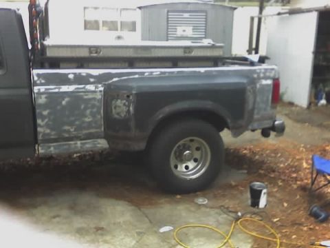 1990 Ford F-350 - Side view of a 1990 Ford F-350 dually truck bed with a toolbox.