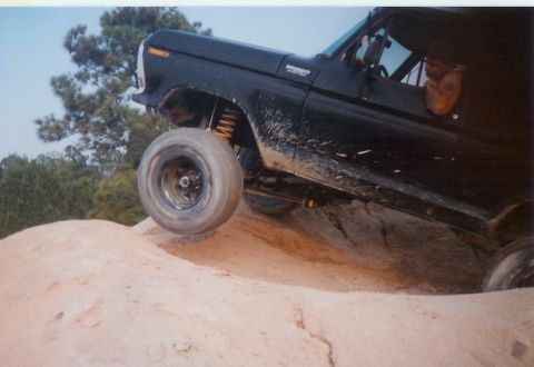 1978 Ford Bronco - This 1978 Ford Bronco is tackling a challenging off-road course.