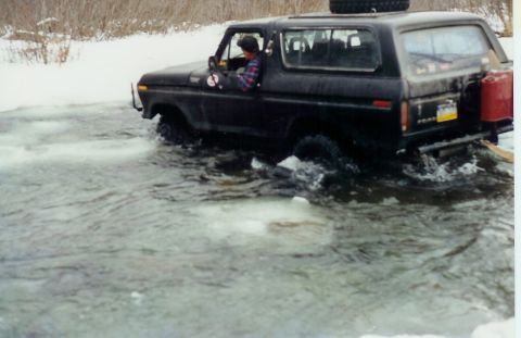 1978 Ford Bronco - This 1978 Ford Bronco navigates through a shallow, icy body of water.