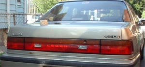 1997 Ford Crown Victoria - Rear view of a sedan, showing 'LEGEND' badging on the taillight assembly.