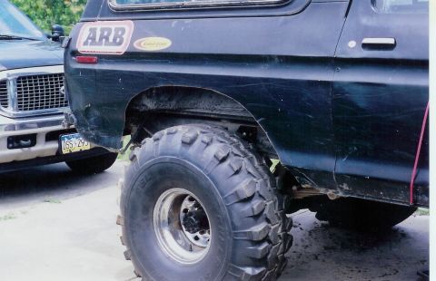 1978 Ford Bronco - This modified Ford Bronco features off-road tires and aftermarket stickers on its exterior.