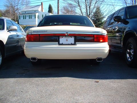 1996 Mercury Grand Marquis - Magnaflow oblong exhaust tips installed! I notched them into my bumper, I trimed the openings with dor edge molding. The tips are rolled, a…