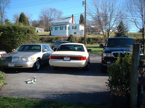 1996 Mercury Grand Marquis - The rear of a 1996 Mercury Grand Marquis shows its dual exhaust tips and clean body lines.