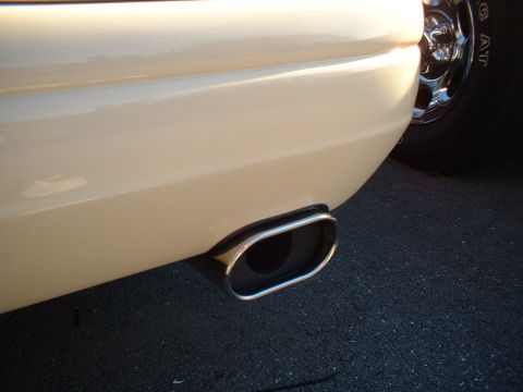 1996 Mercury Grand Marquis - Oval exhaust tip on a vehicle, likely aftermarket.