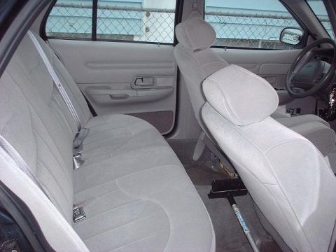 1997 Ford Crown Victoria - Interior view of a 1997 Ford Crown Victoria, highlighting the seats and door panels.
