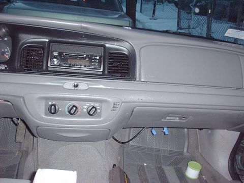 1997 Ford Crown Victoria - Interior view of a 1997 Ford Crown Victoria, showing the dashboard, radio, and climate controls.