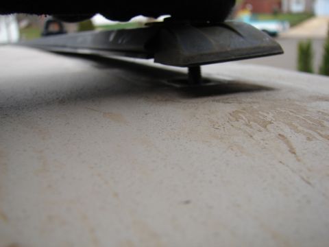 1996 Ford Bronco - A roof rack mount is attached to the roof of a vehicle.