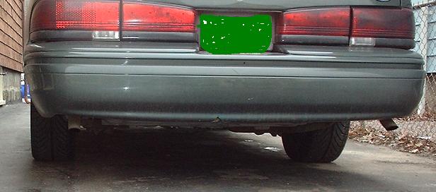 Rear of a 1997 Ford Crown Victoria, dark color