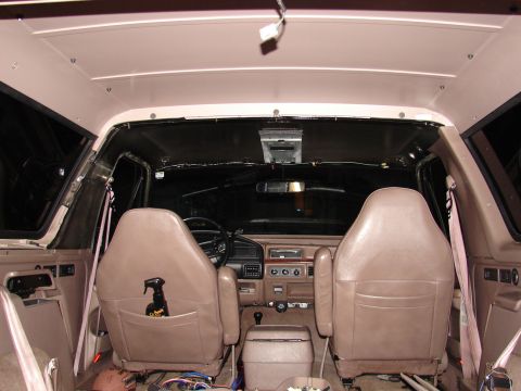 1996 Ford Bronco - The interior of a 1996 Ford Bronco, tan upholstery and the dashboard area.