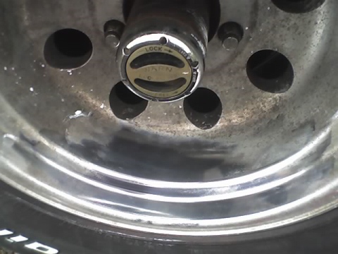 1979 Ford F-150 - Wheel hub with a selector for lock and free positions is visible.