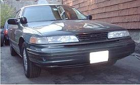 1997 Ford Crown Victoria - This 1997 Ford Crown Victoria is seen from the front, parked in an outdoor setting.