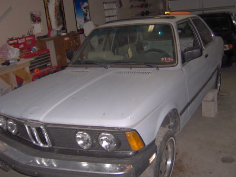 1981 BMW 3 Series - This 1981 BMW 3 Series is parked in a garage, possibly undergoing maintenance.