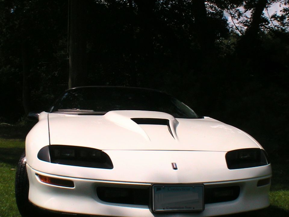 1996 Chevrolet Camaro front view with aftermarket hood scoop