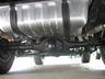 1979 Ford Bronco - This photo shows the undercarriage of a vehicle, including the rear differential and fuel tank.