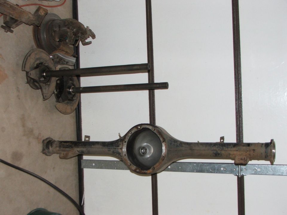 Rear axle assembly and suspension parts, some rusty