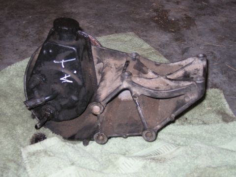 1989 Ford Bronco - Power steering pump assembly shown removed from a vehicle.