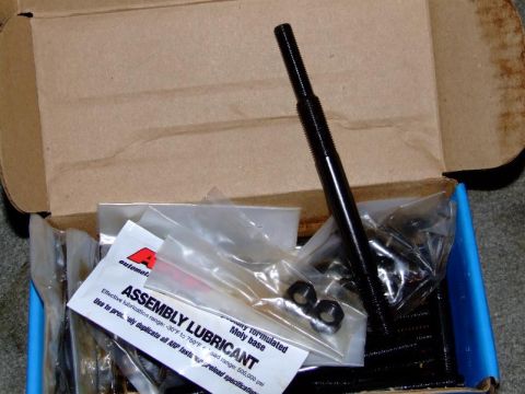 1990 Ford Mustang - A box contains assembly lubricant and various engine hardware components.