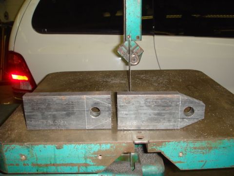 1996 Ford Bronco - Metal fabrication in progress with a white SUV visible in the background.