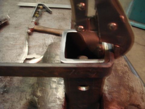 1996 Ford Bronco - Metalworking tools and a square tube are shown in this close-up shot.