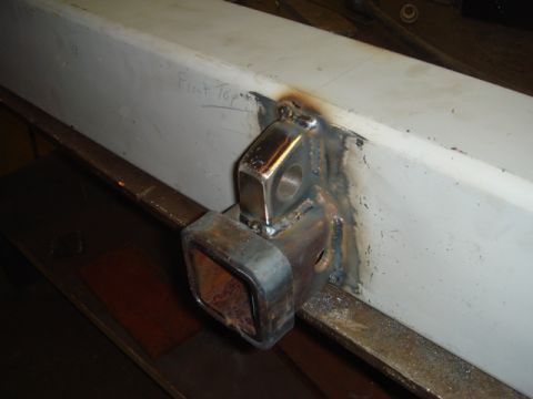 1996 Ford Bronco - A close-up view shows a custom-welded trailer hitch receiver attached to a white bumper, with handwritten text indicating 'Front Top'.