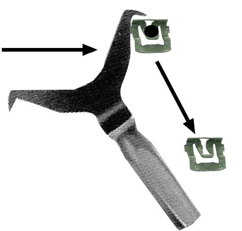 1968 Ford Mustang - A tool is shown demonstrating how to remove a green automotive trim clip.