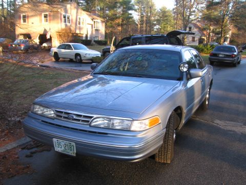 1991 Ford LTD Crown Victoria - Front view of a 1991 Ford Crown Victoria LTD, parked in a residential driveway.