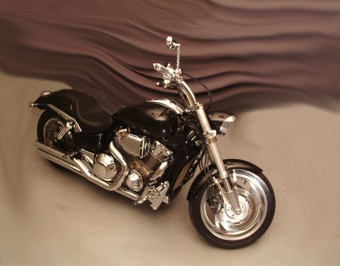 1995 Ford Bronco - A black motorcycle with chrome details is displayed against a textured background.