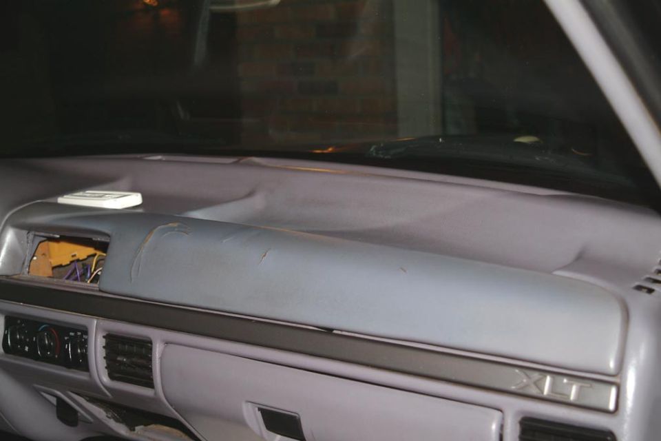 old cracked dash pad