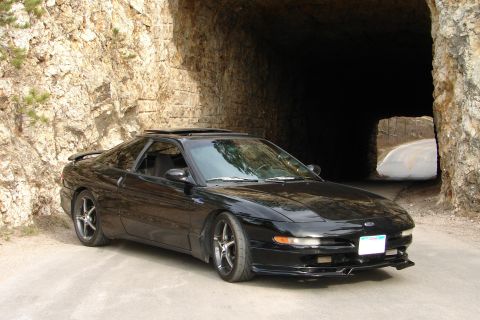 1995 Ford Probe - Tunnel through a granite wall near Mt. Rushmore.