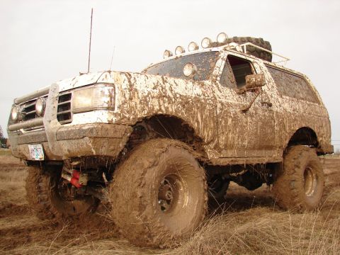 1996 Ford Bronco - This 1996 Ford Bronco is heavily caked in mud after an off-road adventure.