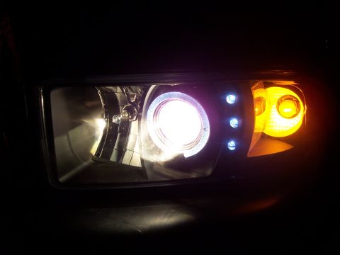 2001 Dodge 1500 - This is a close-up of a modified headlight assembly, a projector beam and LED accents.