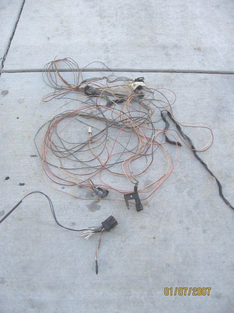 1994 Ford Bronco - Vehicle wiring harness with connectors is spread out on a concrete surface. Date stamp reads 01/07/2007.