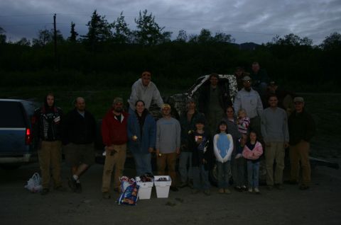 2003 Jeep TJ - A group gathers around vehicles at an outdoor event.