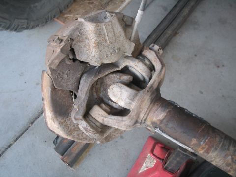 1991 Ford Bronco - Rusted Dana 44 axle assembly, likely from an older 4x4 vehicle.