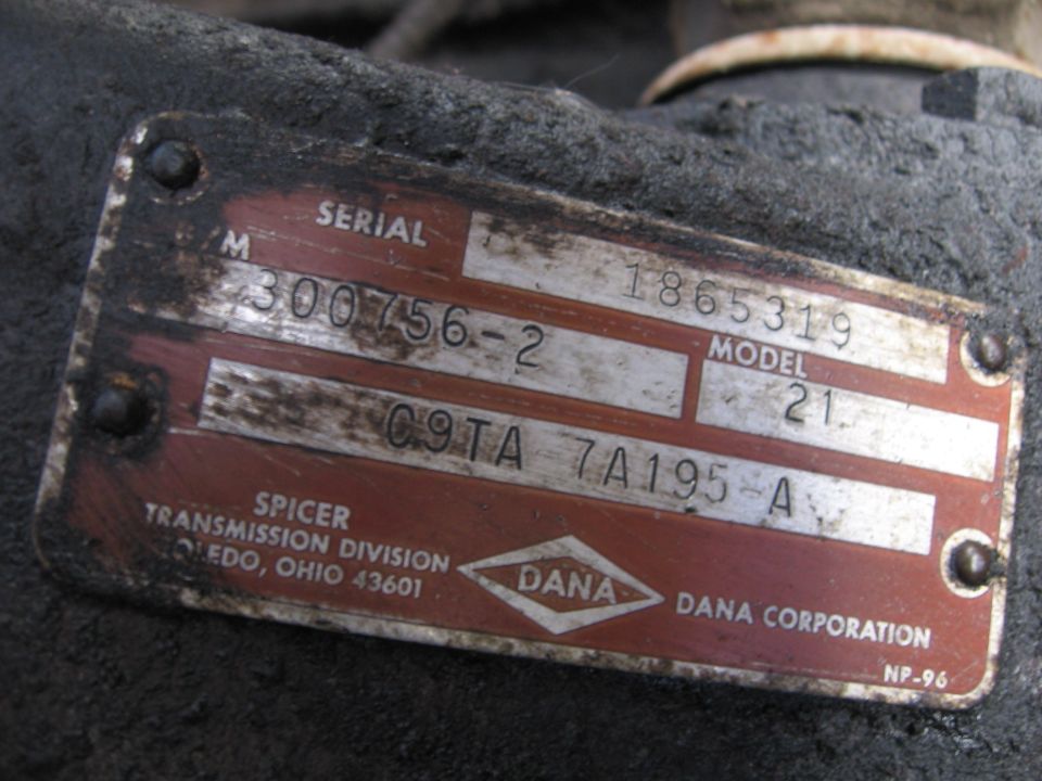 Spicer Dana axle identification tag stamped with model and serial numbers