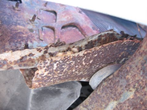 1974 Ford F-100 - The vehicle's frame shows significant rust and deterioration.
