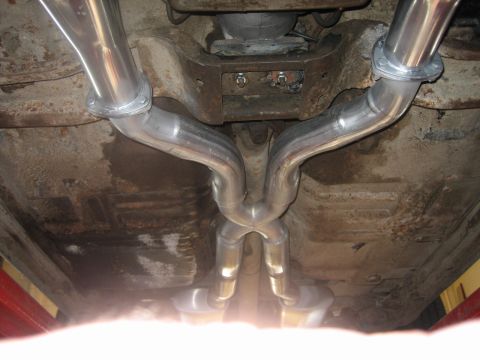 1976 Ford Ranchero - Underside view of a dual exhaust system, showing the Y-pipe and mufflers.
